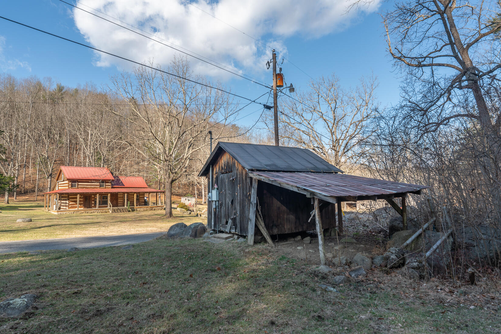 6102 Jennings Creek Road Buchanan, VA 24066 - Photo 62 of 79 a view of a chairs and table in the backyard