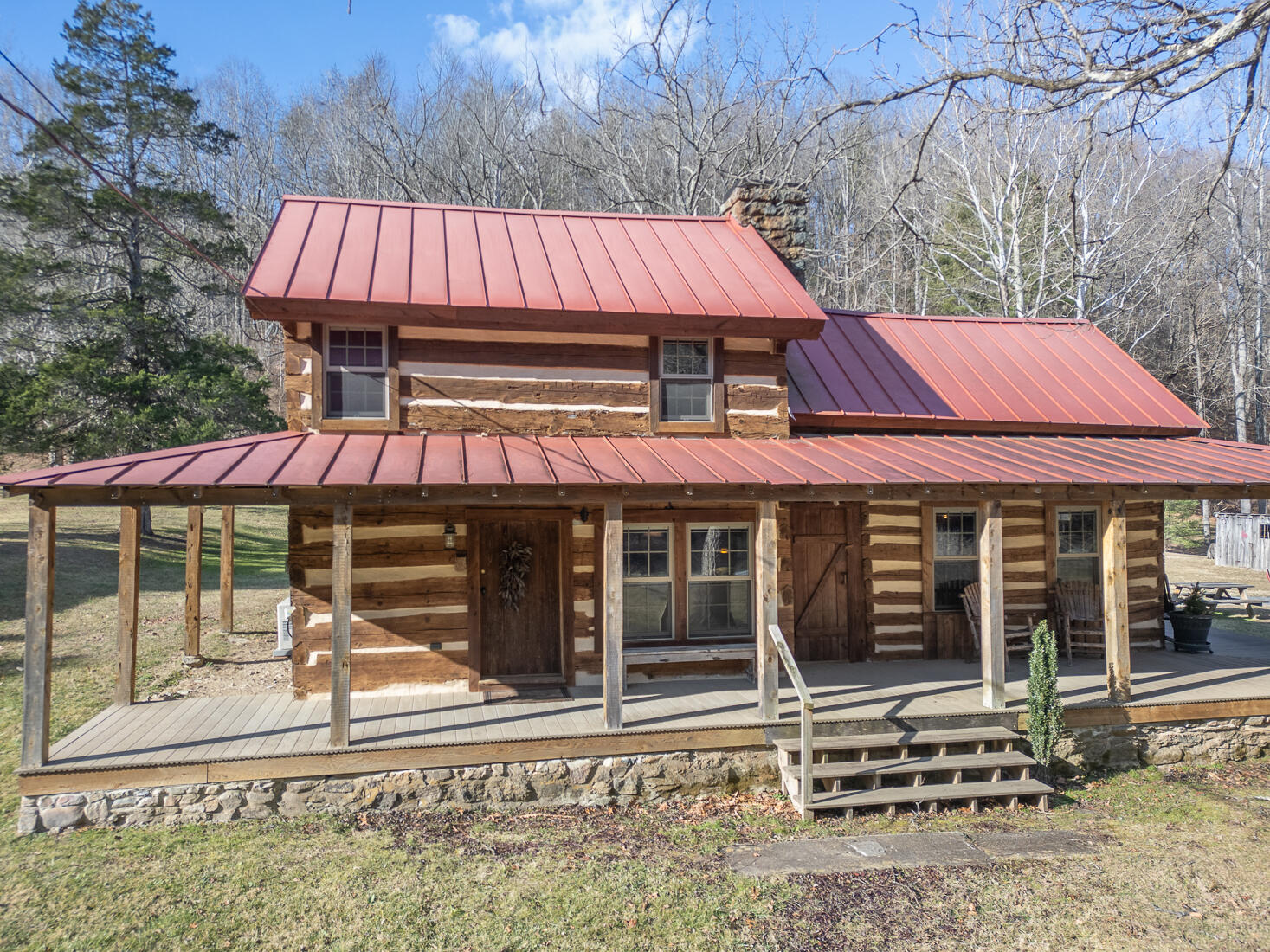 6102 Jennings Creek Road Buchanan, VA 24066 - Photo 70 of 79 a front view of a house with porch and garden
