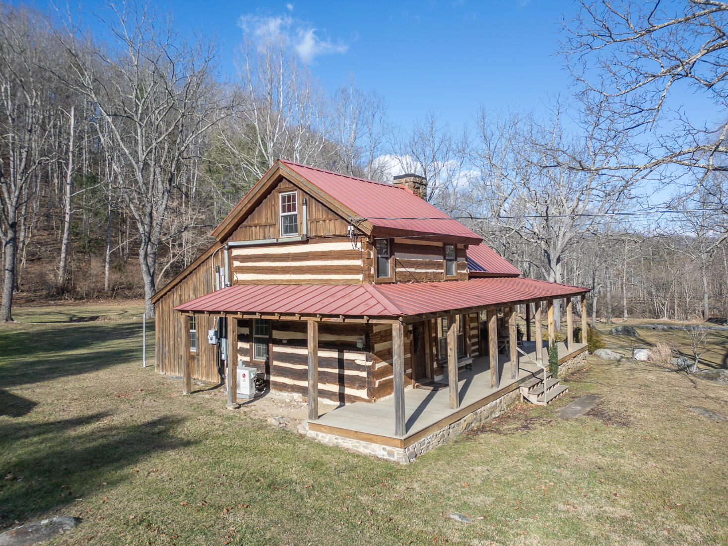 6102 Jennings Creek Road Buchanan, VA 24066 - Photo 7 of 79 a view of a house with a yard balcony and wooden fence