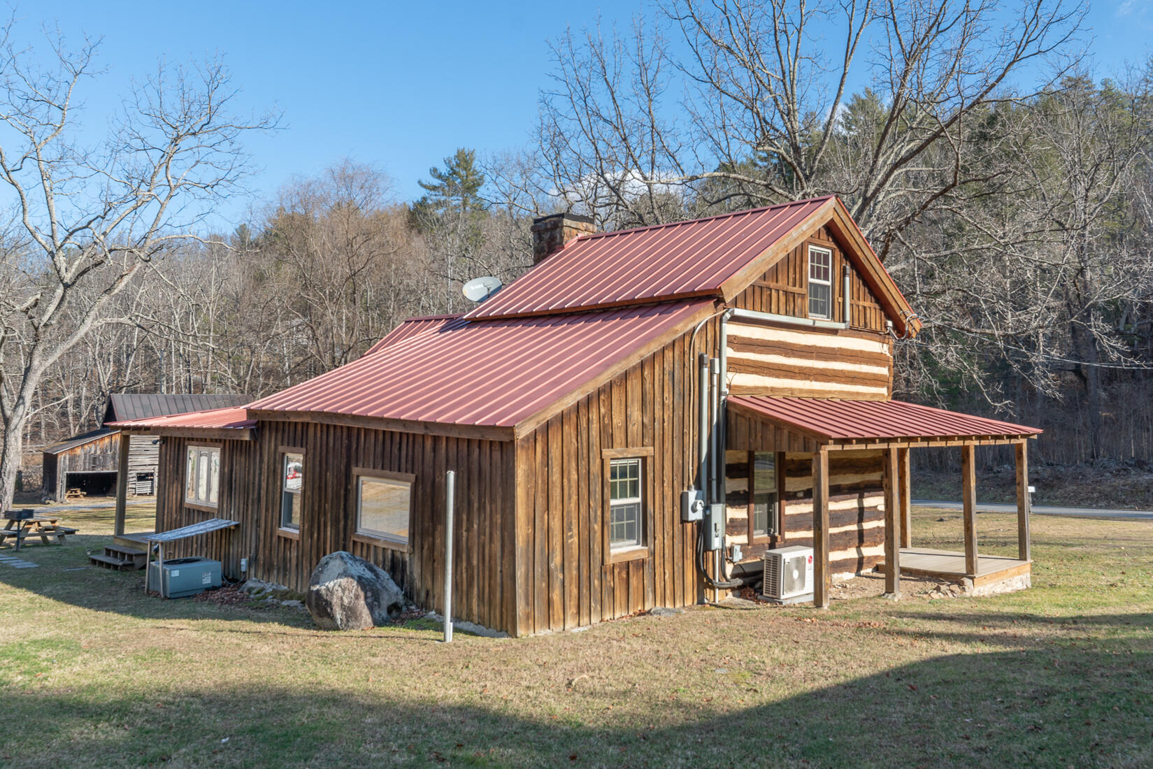 6102 Jennings Creek Road Buchanan, VA 24066 - Photo 76 of 79 a front view of a house with a yard and glass window