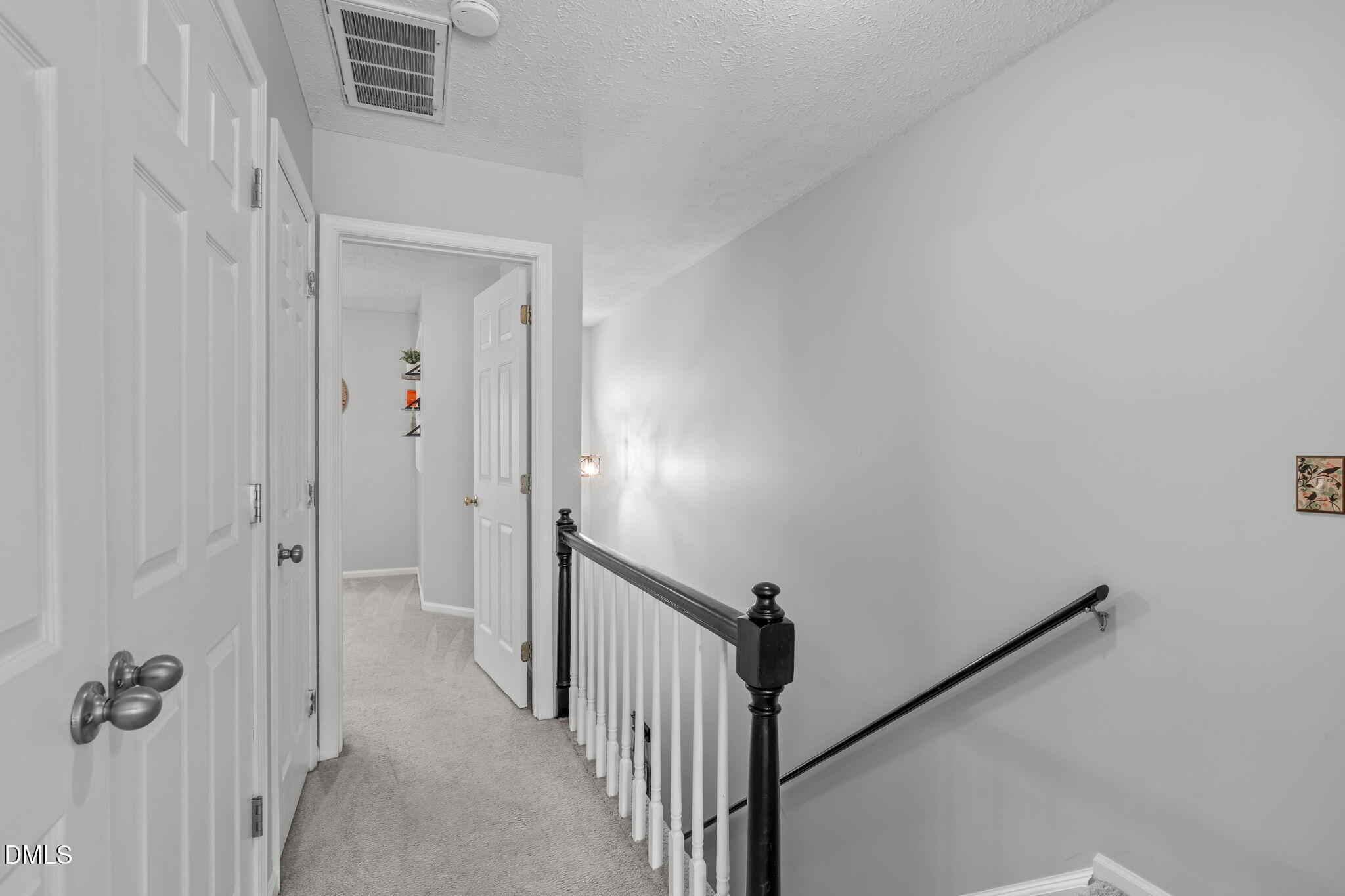 203 Oak Hollow Court Raleigh, NC 27613 - Photo 17 of 37 a view of a hallway with closet