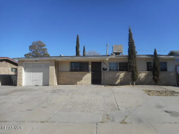 a view of a house with a roof deck