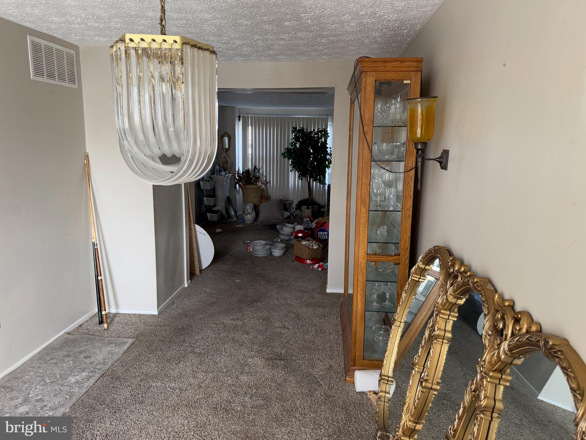 2512 Ridgely Street Baltimore, MD 21230 - Photo 4 of 16 a view of a livingroom with furniture and a chandelier