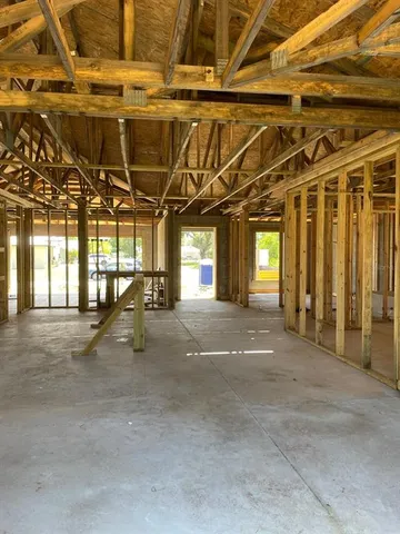 a view of a room with wooden walls