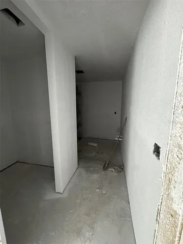 an empty room with a door