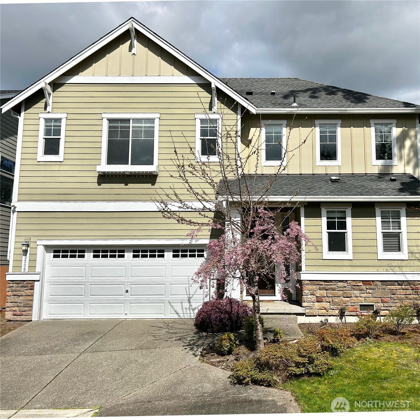 19509 38th Drive Southeast Bothell, WA 98012 - Photo 1 of 1 a view of a house with a yard