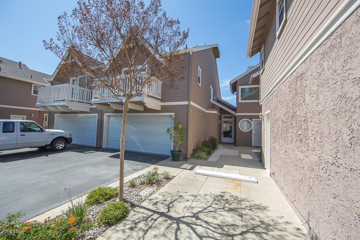 1854 Rory Lane, Unit 3 Simi Valley, CA 93063 - Photo 2 of 29 a view of a house with a yard