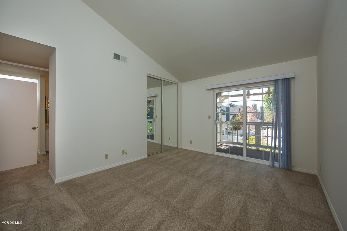 1854 Rory Lane, Unit 3 Simi Valley, CA 93063 - Photo 19 of 29 a view of an empty room with a window