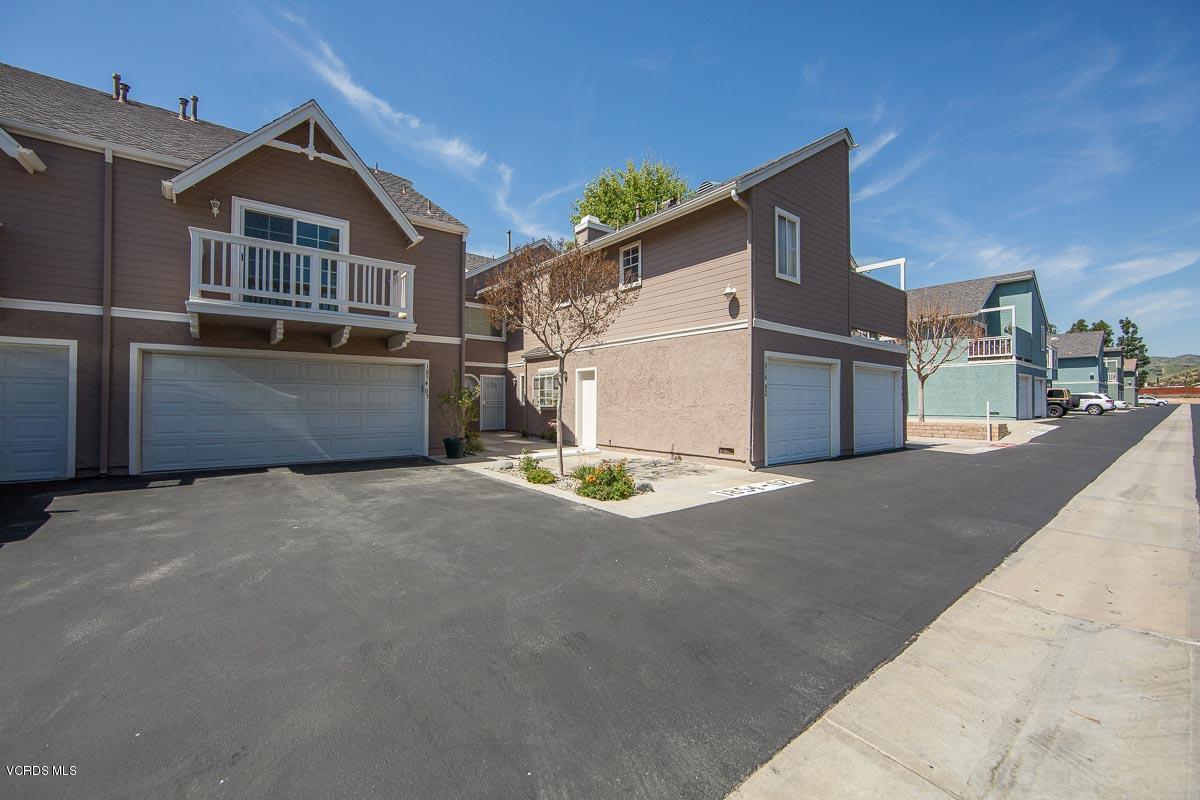 1854 Rory Lane, Unit 3 Simi Valley, CA 93063 - Photo 3 of 29 a view of a house with a yard
