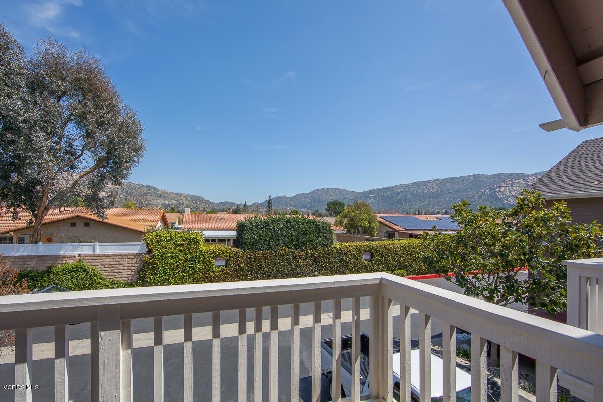 1854 Rory Lane, Unit 3 Simi Valley, CA 93063 - Photo 27 of 29 a view of a balcony with wooden fence and floor