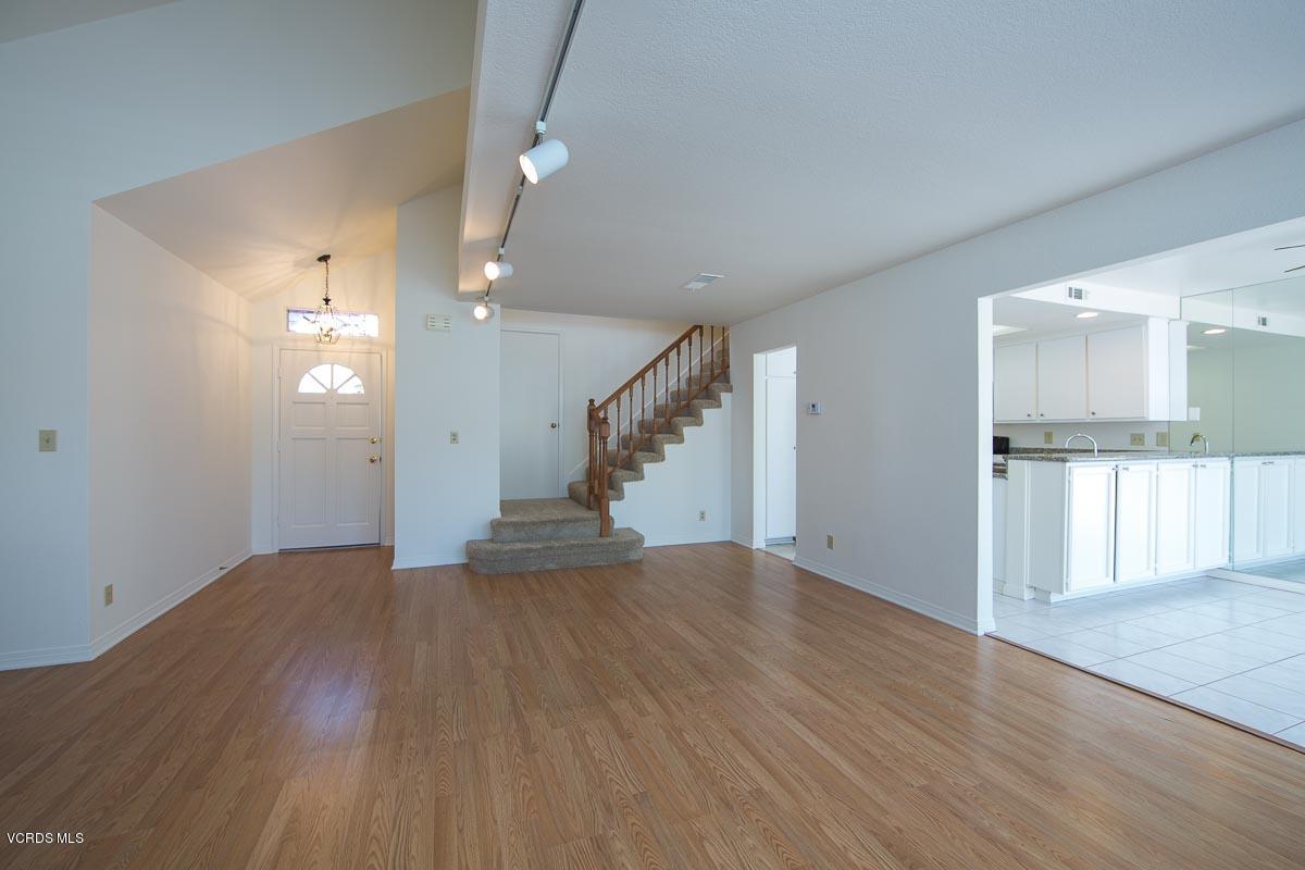 1854 Rory Lane, Unit 3 Simi Valley, CA 93063 - Photo 6 of 29 an empty room with wooden floor and entryway