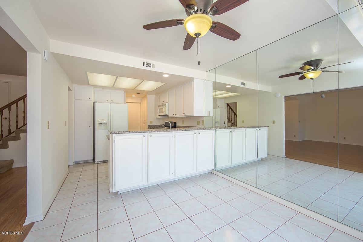 1854 Rory Lane, Unit 3 Simi Valley, CA 93063 - Photo 8 of 29 a view of a kitchen with a sink and cabinet