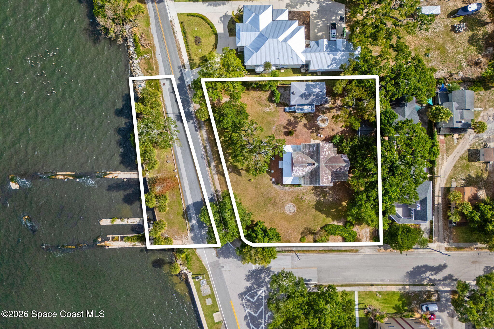 1101 Rockledge Drive Rockledge, FL 32955 - Photo 3 of 76 an aerial view of residential house with outdoor space and swimming pool