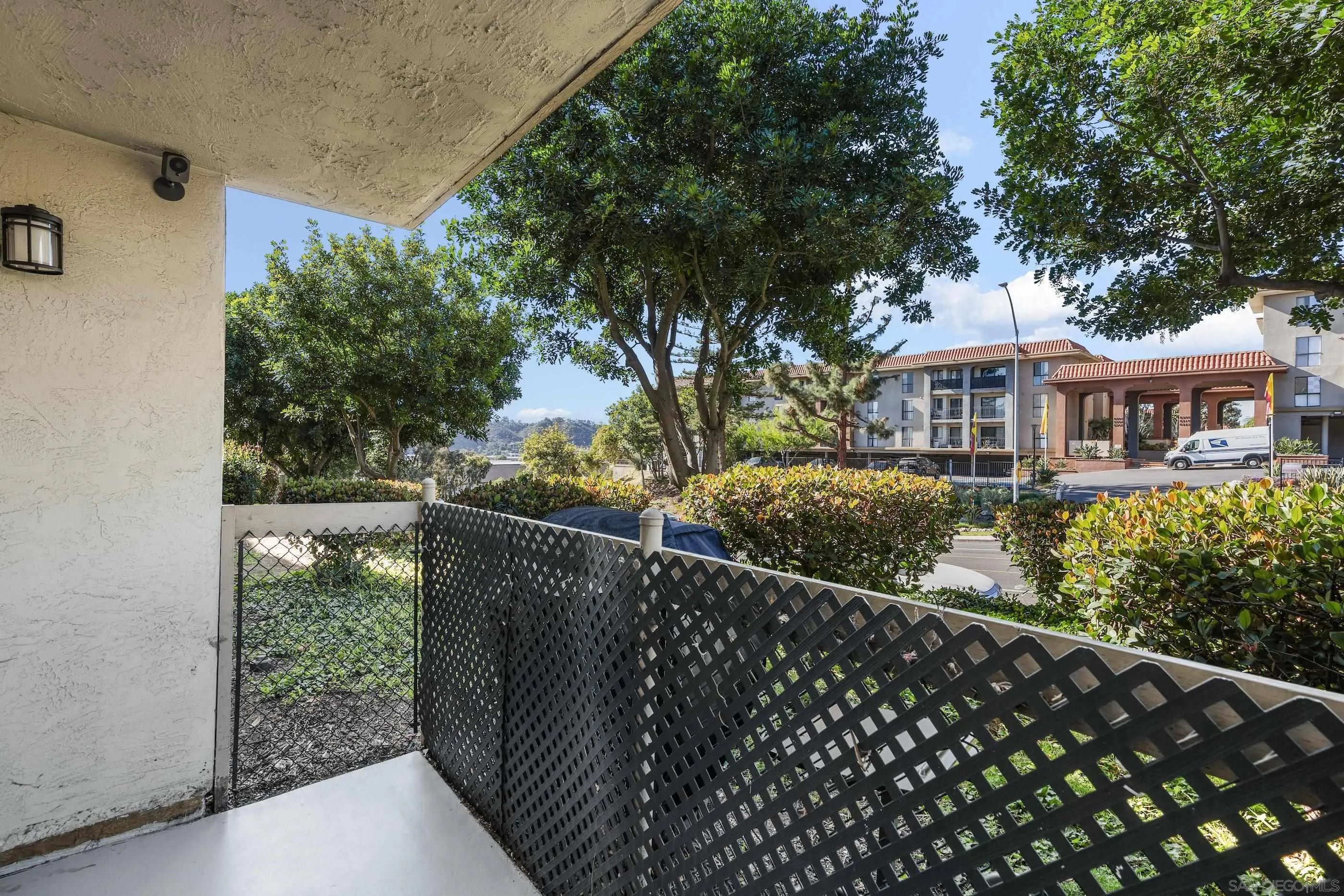 6275 Rancho Mission Road, Unit 105 San Diego, CA 92108 - Photo 14 of 24 a view of a small yard from a balcony