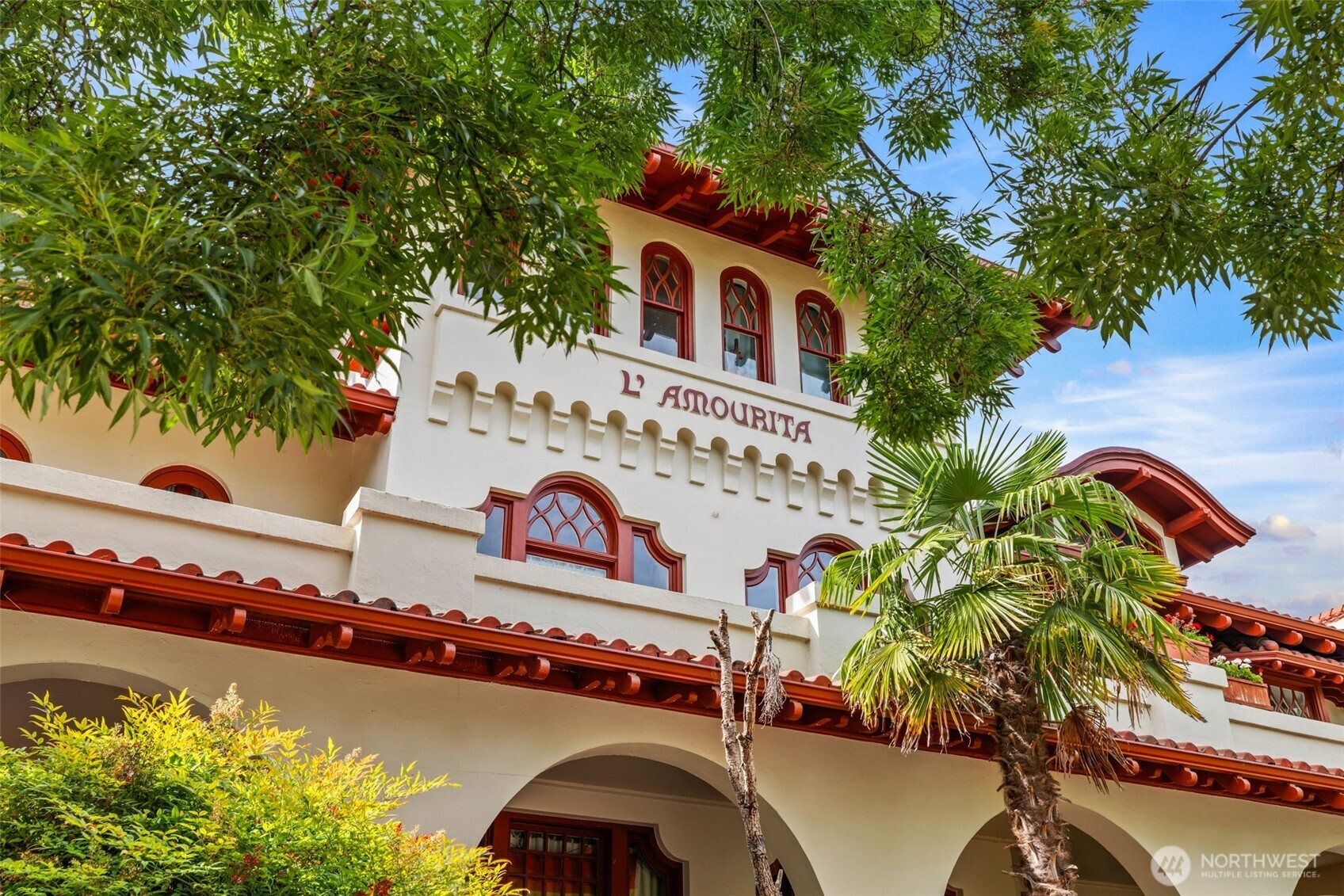 2915 Franklin Avenue East, Unit A Seattle, WA 98102 - Photo 31 of 34 an aerial view of a house with a yard and outdoor seating