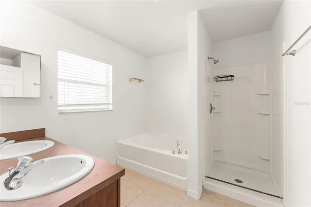 a kitchen with stainless steel appliances granite countertop a stove top oven a sink and dishwasher