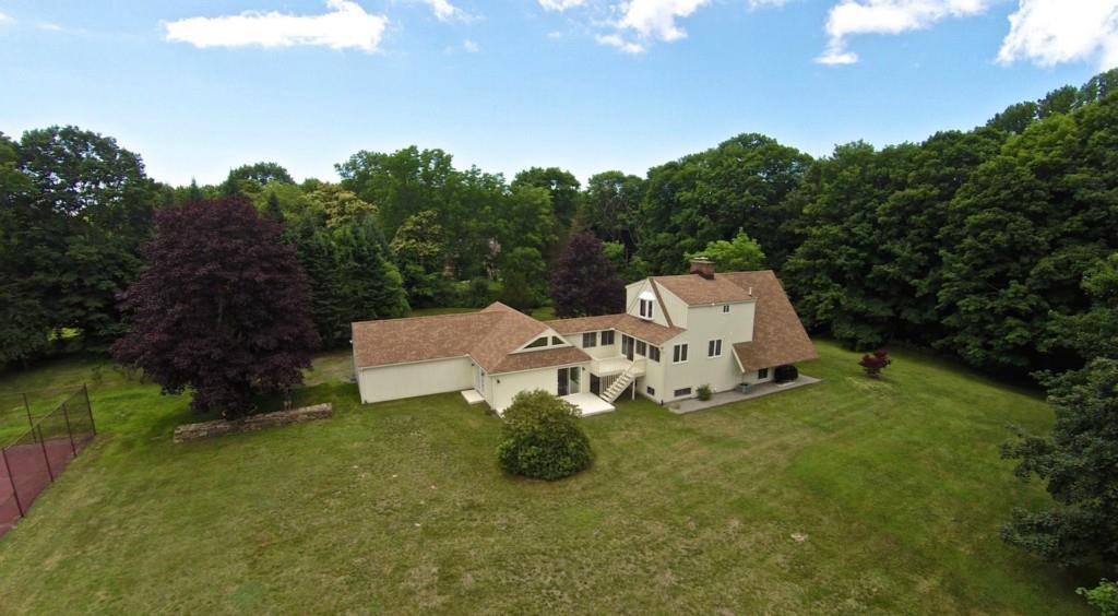 48 Carter Hill Road Clinton, CT 06413 - Photo 1 of 1 a view of a house with a yard and sitting area