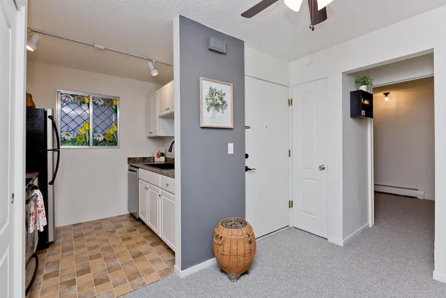 a room with window and ceiling fan