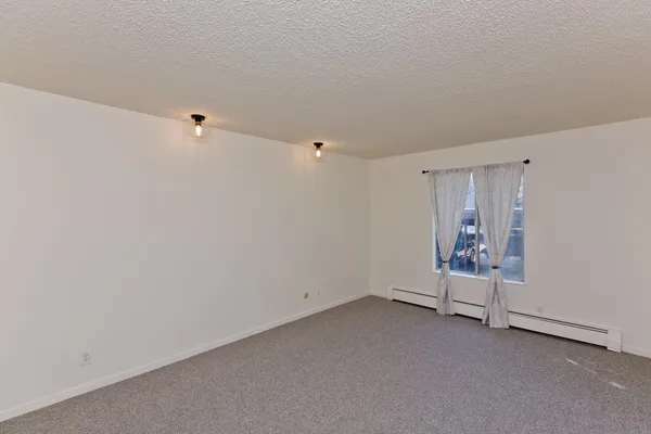 a bathroom with a sink a vanity and a mirror