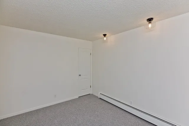 a picture of a bench in front of a door