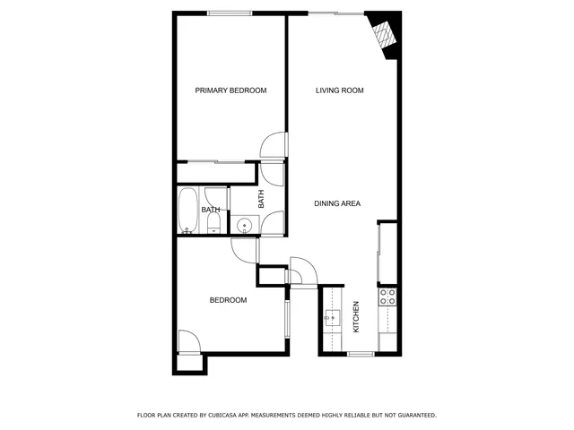 a view of a house with a yard and plants