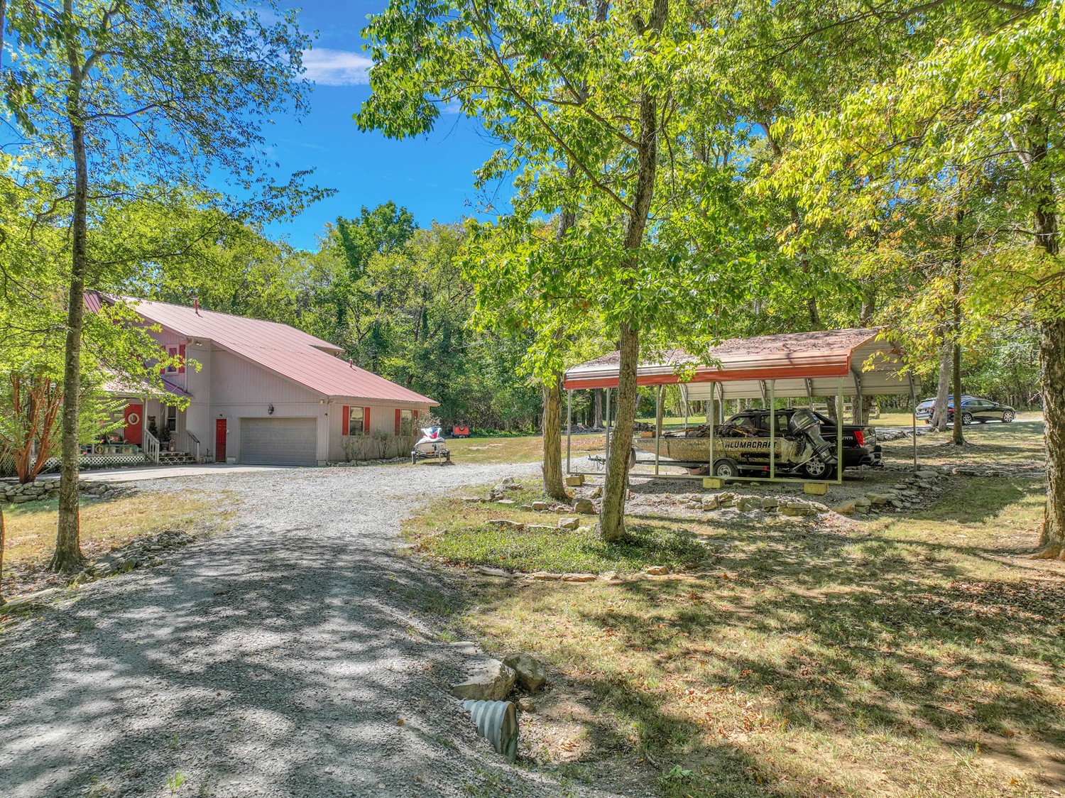 7004 Vanderbilt Road Old Hickory, TN 37138 - Photo 5 of 32 a house with trees in the background