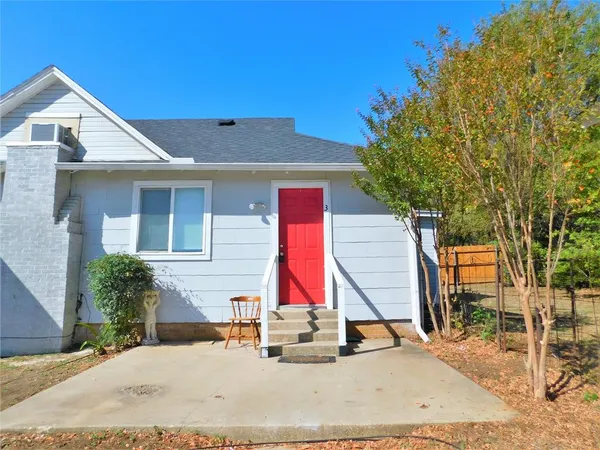 a view of a house with a park
