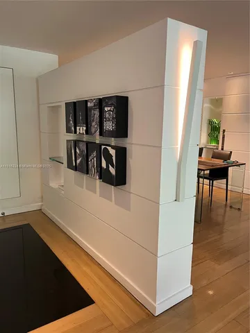 a kitchen with a stove and a refrigerator