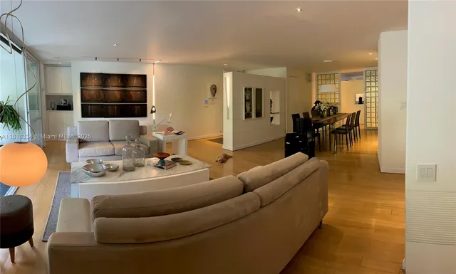 a bathroom with a sink a toilet a mirror and vanity