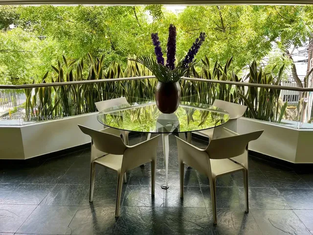 a view of fireplace with a hallway