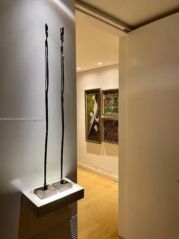 a bedroom with bed and a window