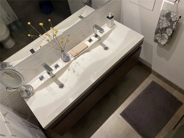 a view of a garden with a lake