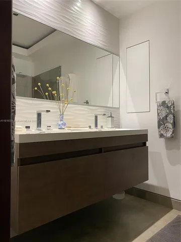 a view of a garden with a swimming pool