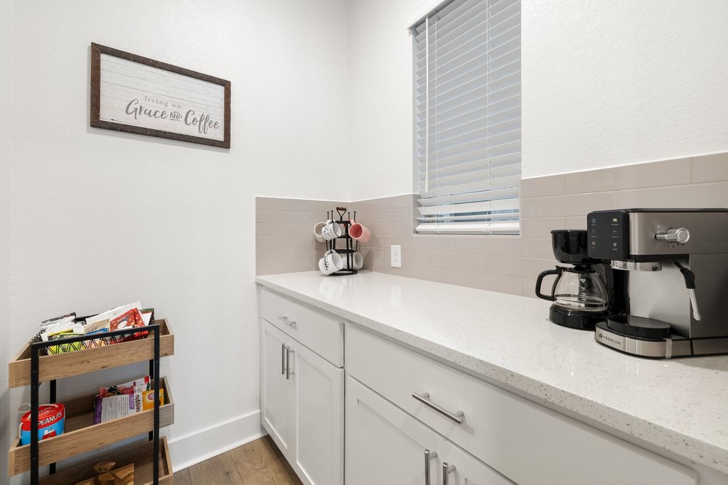 1113 Spring Gulch Lane Georgetown, TX 78628 - Photo 12 of 19 a kitchen with a sink and cabinets