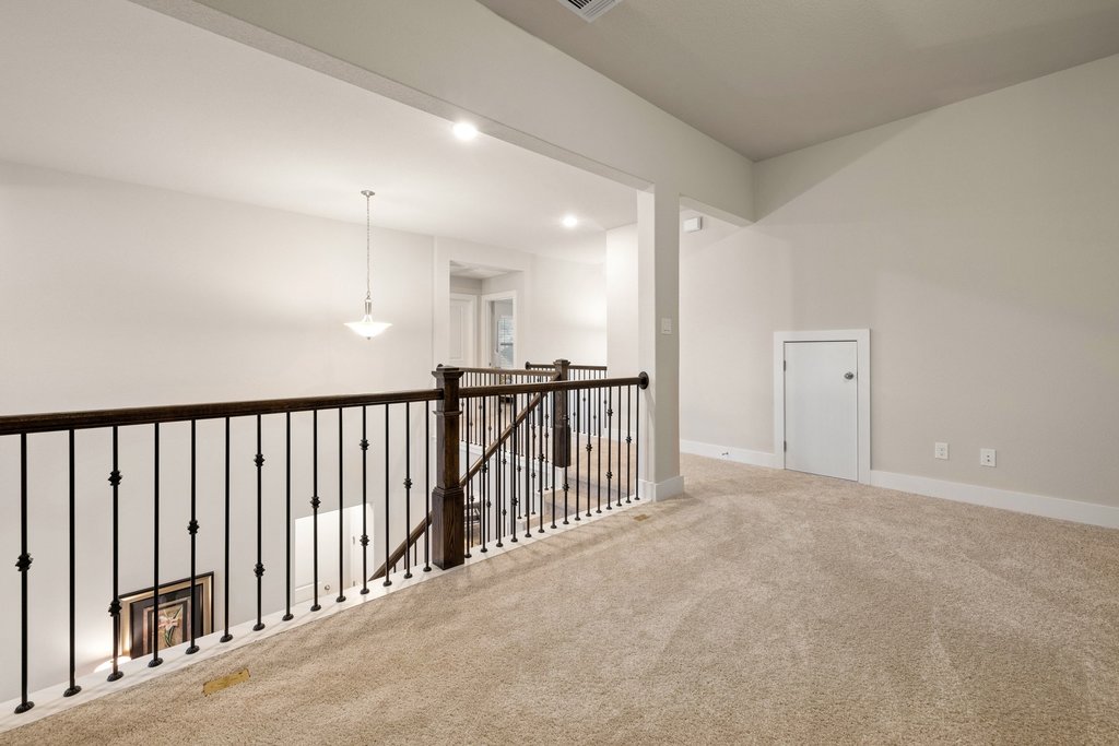 1113 Spring Gulch Lane Georgetown, TX 78628 - Photo 16 of 19 a view of a hallway