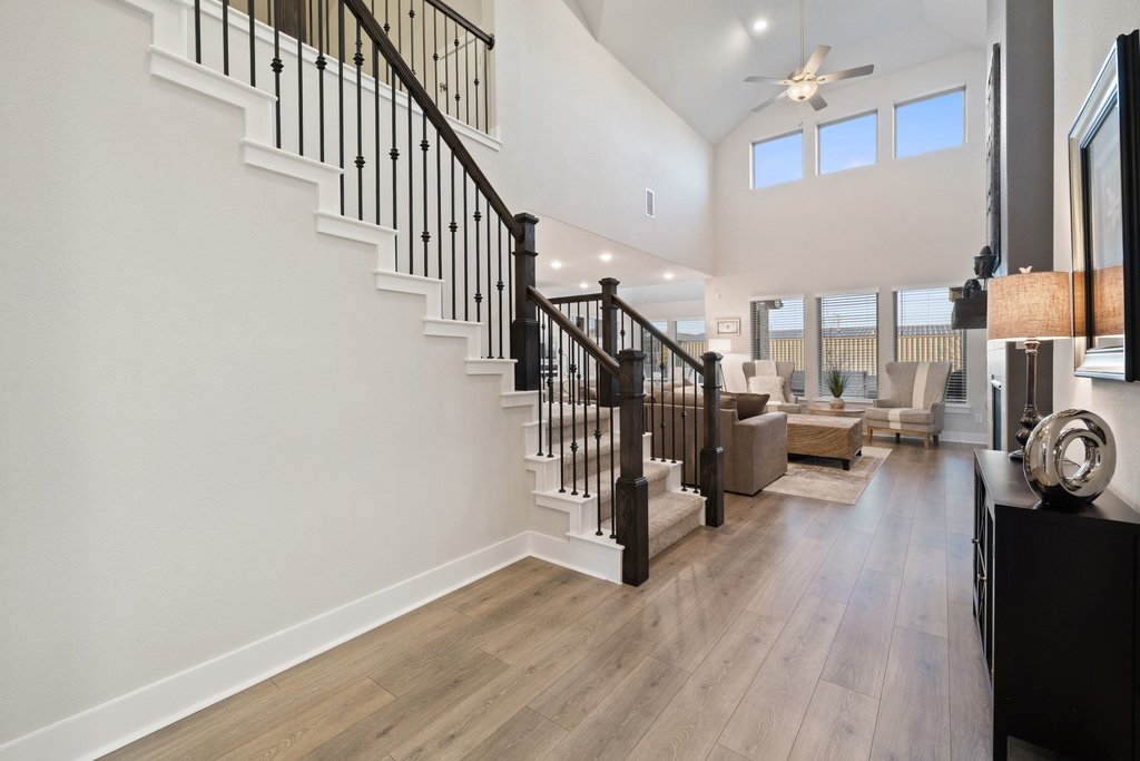 1113 Spring Gulch Lane Georgetown, TX 78628 - Photo 7 of 19 a view of entryway and hall with wooden floor