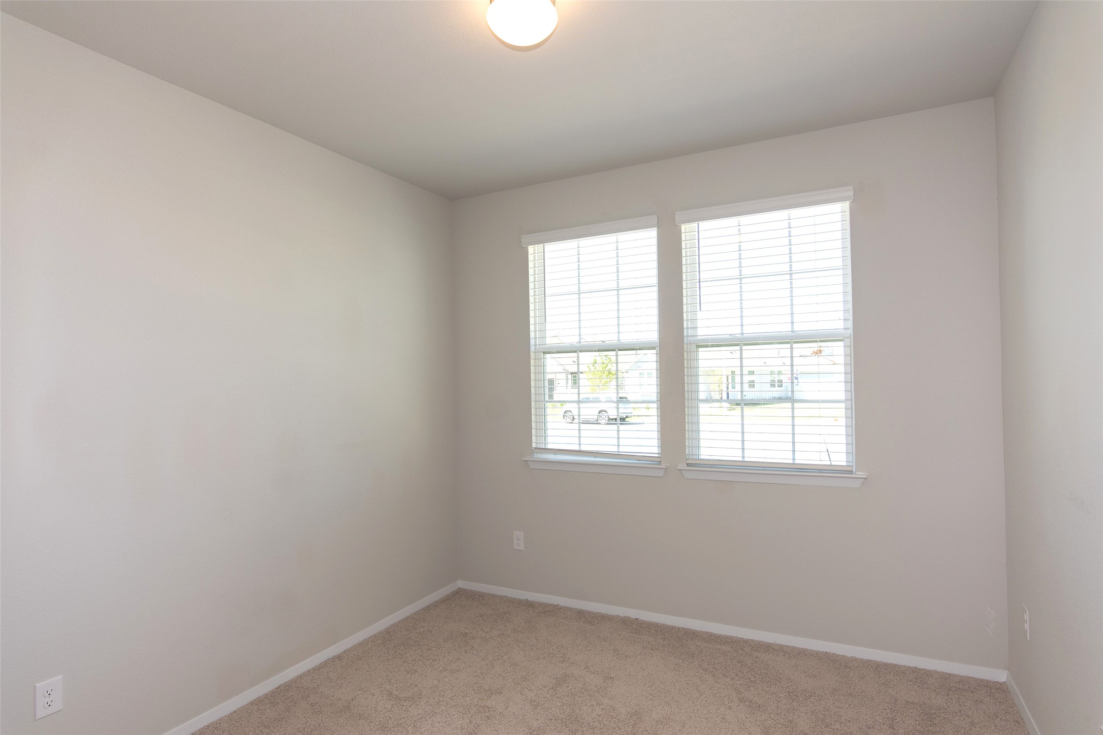 350 Fabion Street Kyle, TX 78640 - Photo 15 of 33 an empty room with a window
