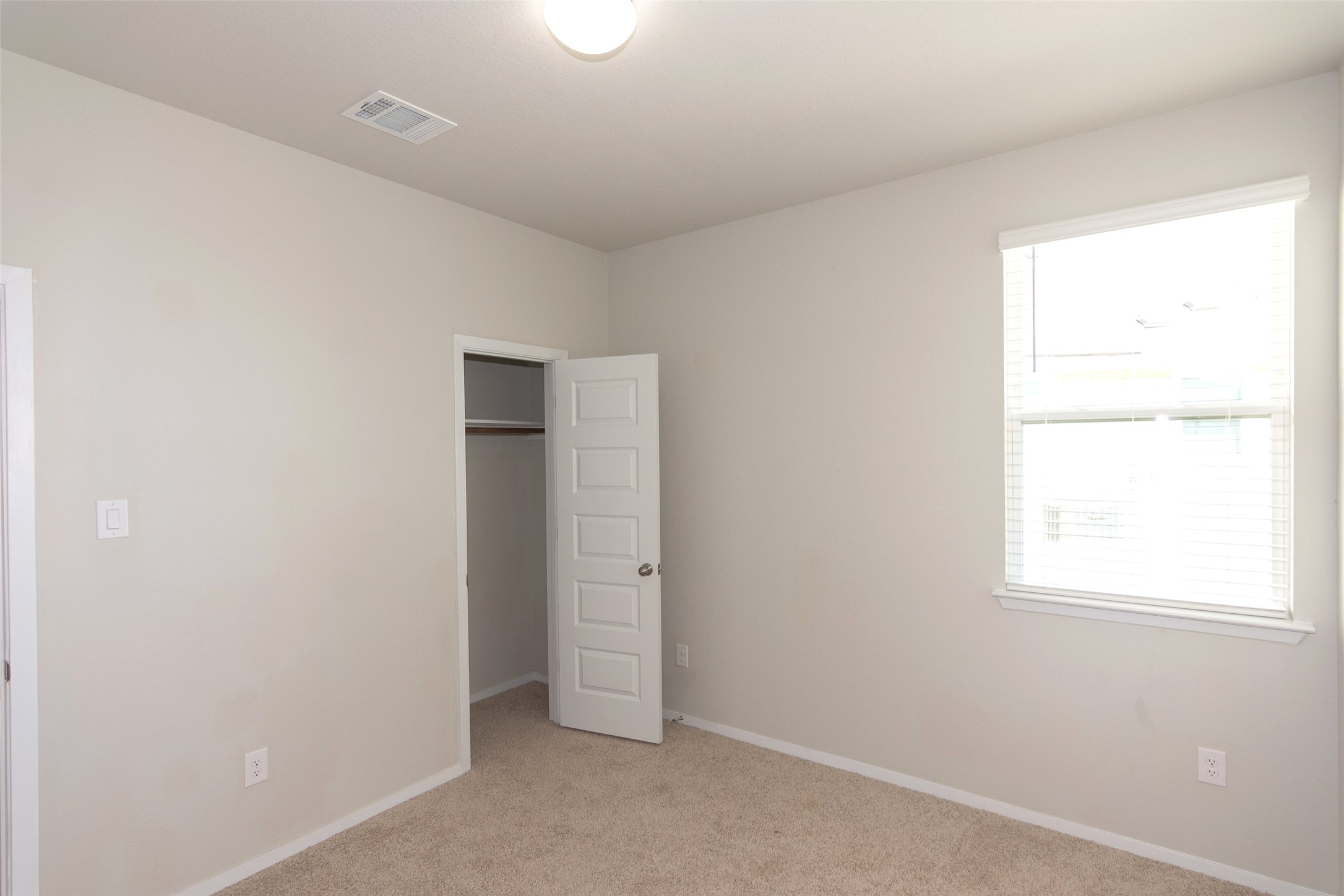350 Fabion Street Kyle, TX 78640 - Photo 16 of 33 an empty room with windows and closet