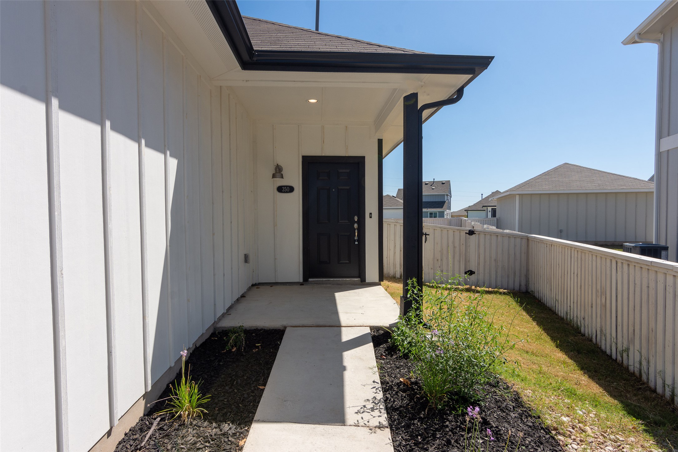 350 Fabion Street Kyle, TX 78640 - Photo 20 of 33 a view of a back yard from a balcony