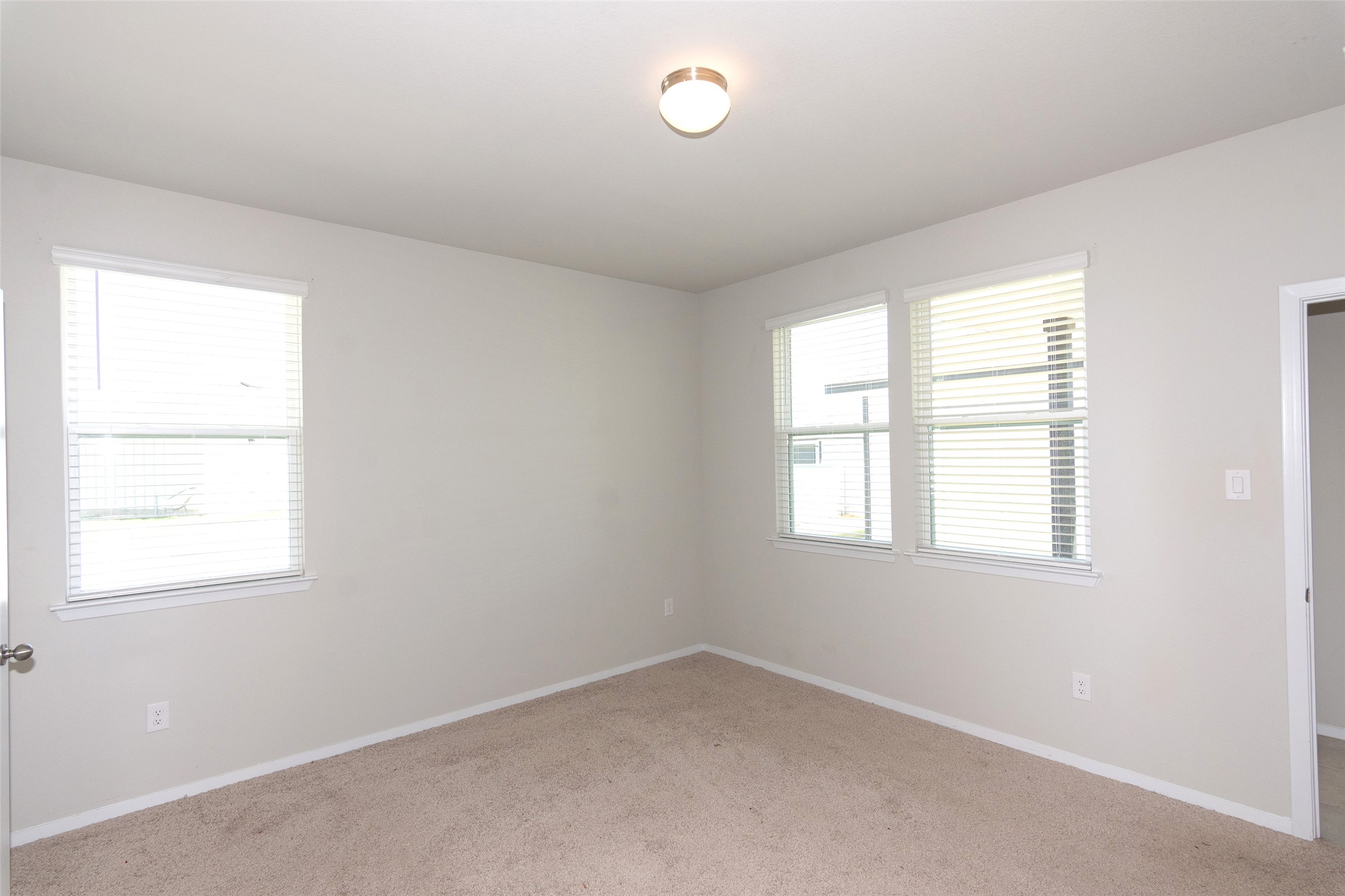 350 Fabion Street Kyle, TX 78640 - Photo 25 of 33 an empty room with a window