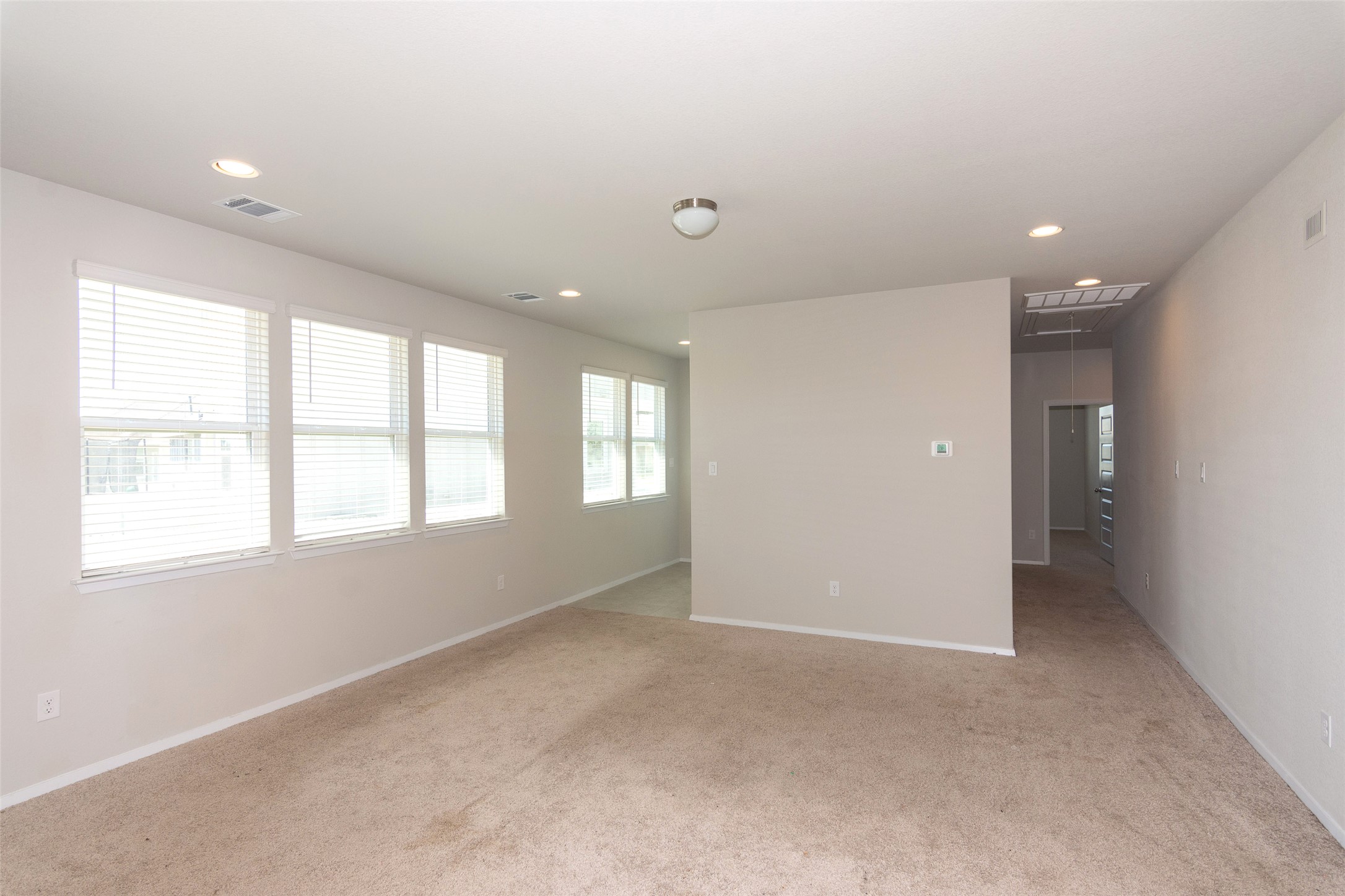 350 Fabion Street Kyle, TX 78640 - Photo 7 of 33 a view of an empty room with a window