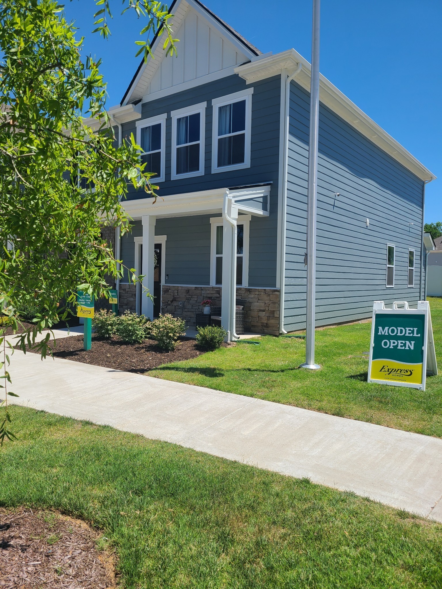 130 Cecil Road Lebanon, TN 37087 - Photo 4 of 46 a front view of a house with a yard and garage