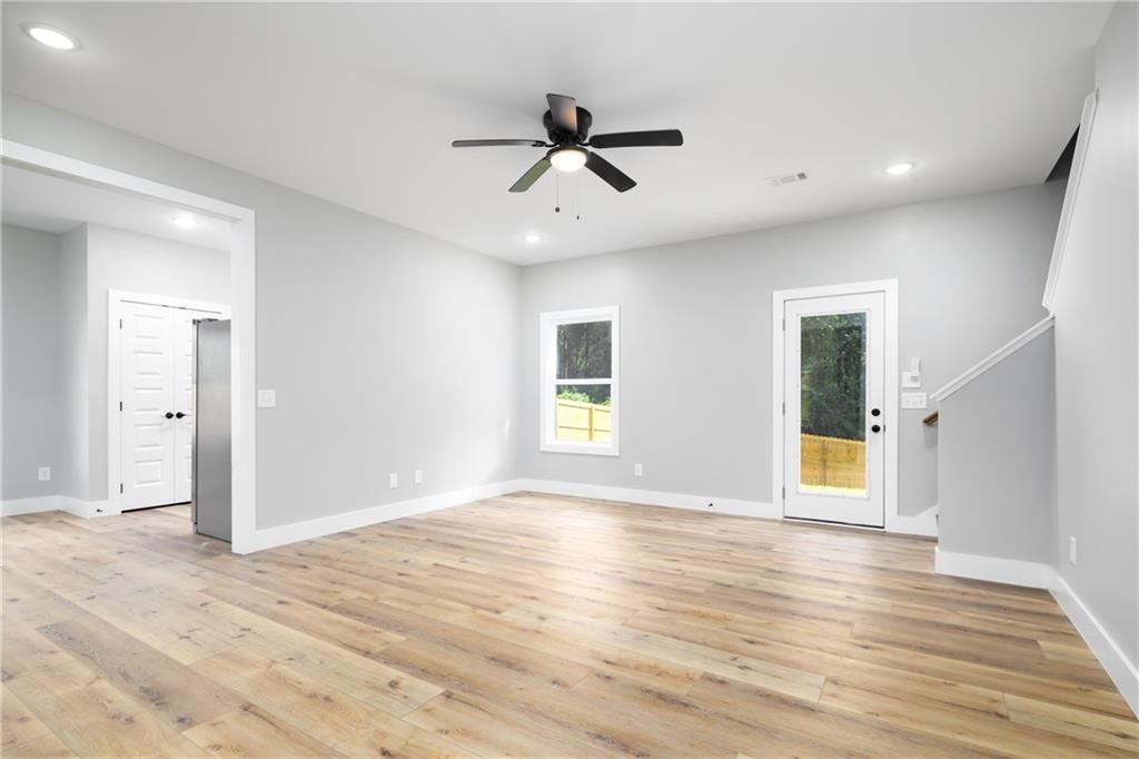 111 Lee Road Phenix City, AL 36867 - Photo 9 of 23 Wood-finish flooring, recessed lighting, and a ceiling fan with light fixture