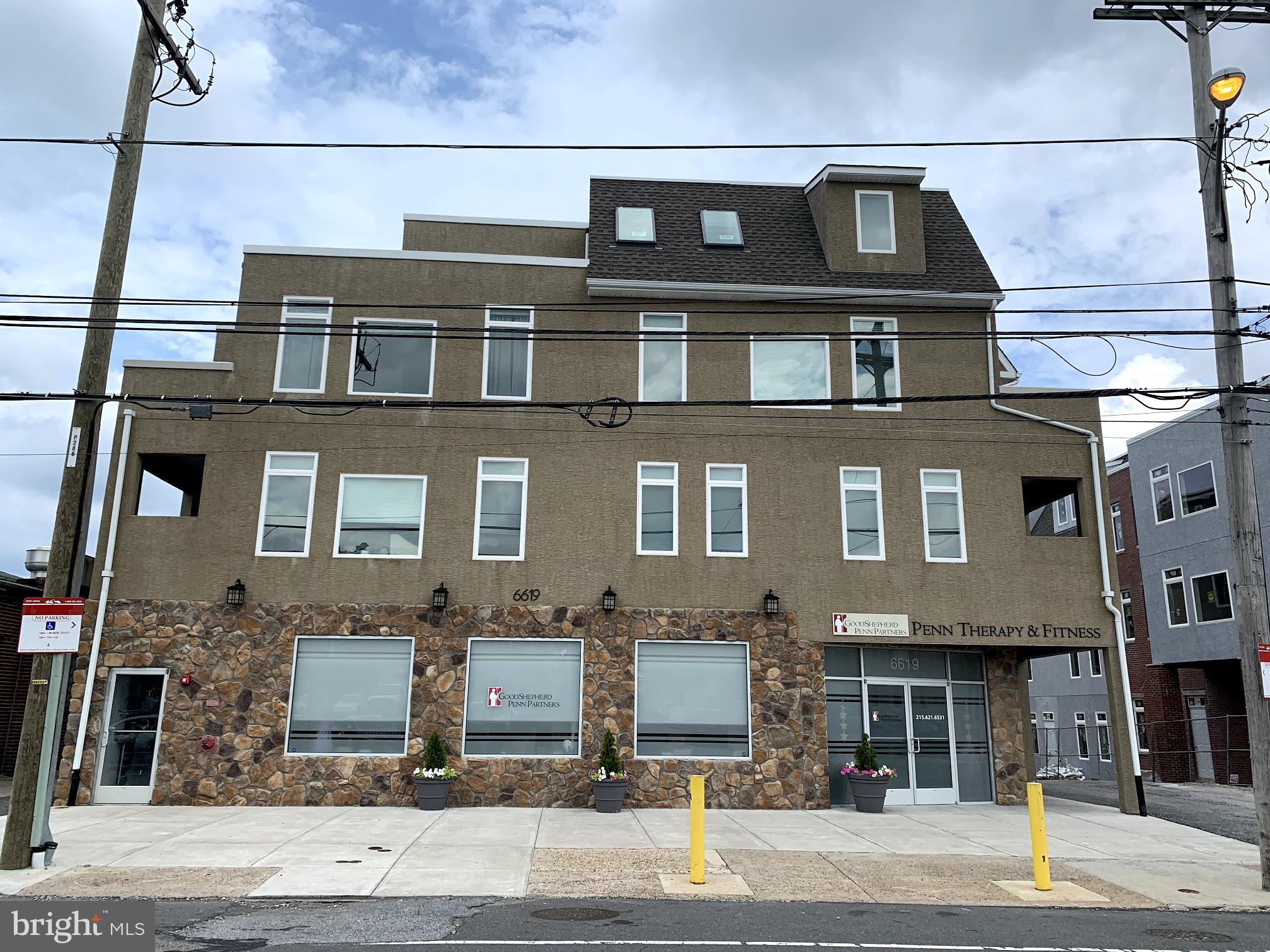 6619 Ridge Avenue, Unit 204 Philadelphia, PA 19128 - Photo 8 of 8 a front view of a building