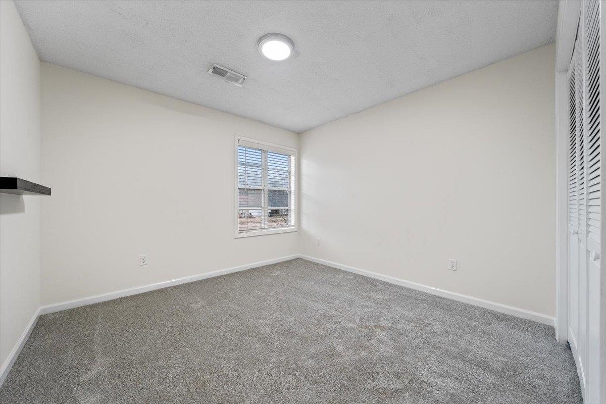 947 Hunters Retreat Drive Collierville, TN 38017 - Photo 14 of 24 an empty room with windows