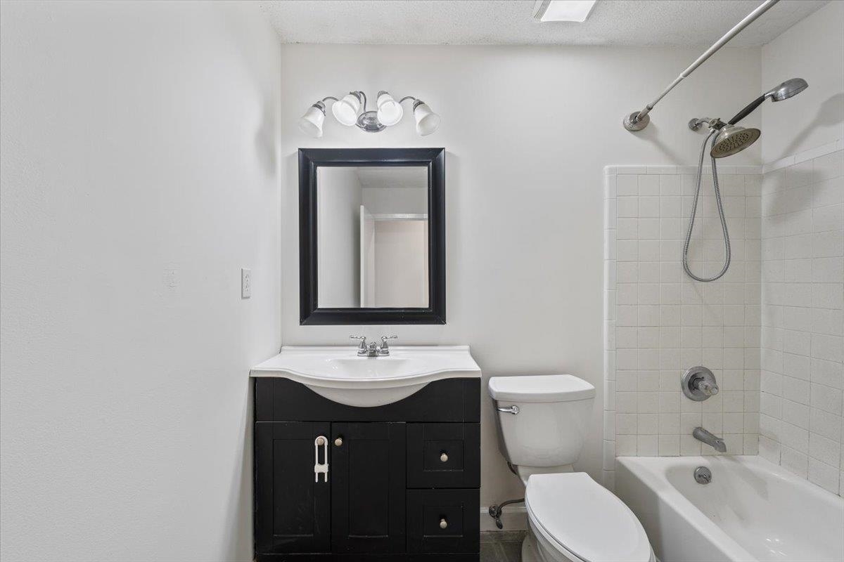 947 Hunters Retreat Drive Collierville, TN 38017 - Photo 15 of 24 a bathroom with a sink vanity mirror and toilet