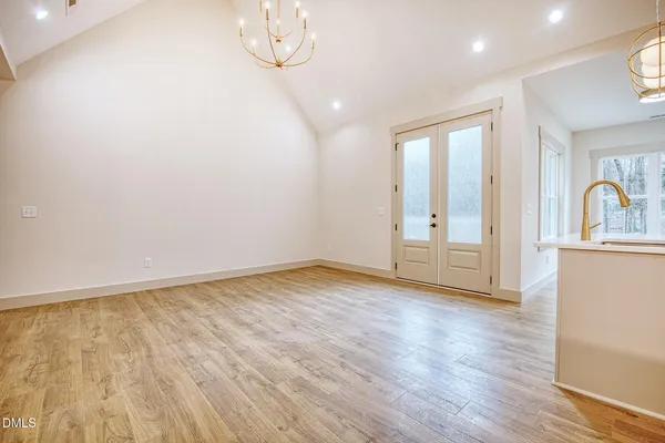 a kitchen with a sink cabinets and window