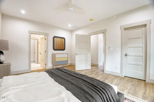 wooden floor in an empty room with a closet