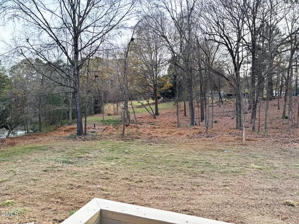 a view of deck with wooden floor and fence