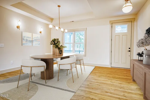 a view of a dining room with furniture